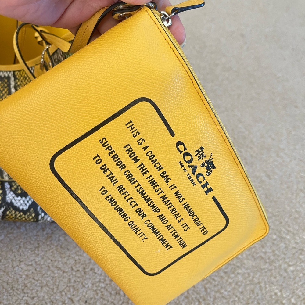 Reversible coach tote.